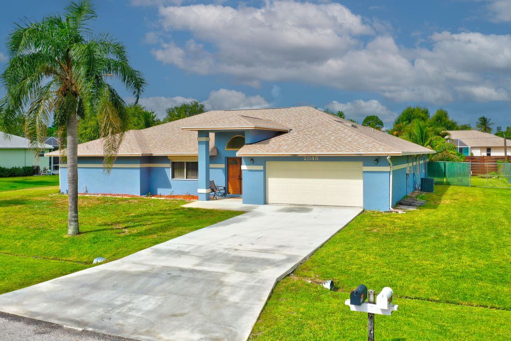 Photo of 2048 SE Harding Street, Port St Lucie, FL 34952 (MLS # R10813260)