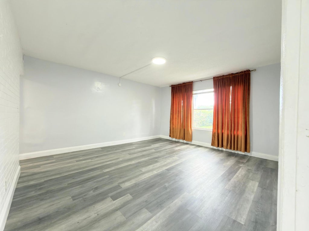 Photo of 131 E 27TH Street #6, Riviera Beach, FL 33404 (MLS # B26080322)