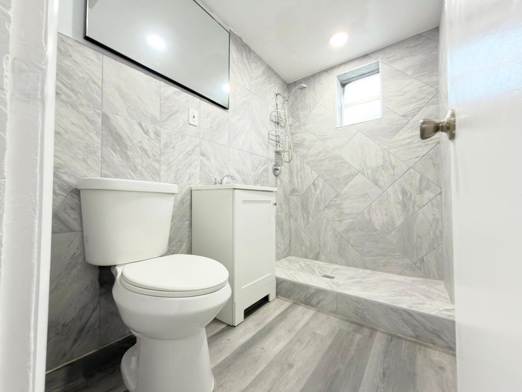 Photo of 131 E 27TH Street #6, Riviera Beach, FL 33404 (MLS # B26080322)