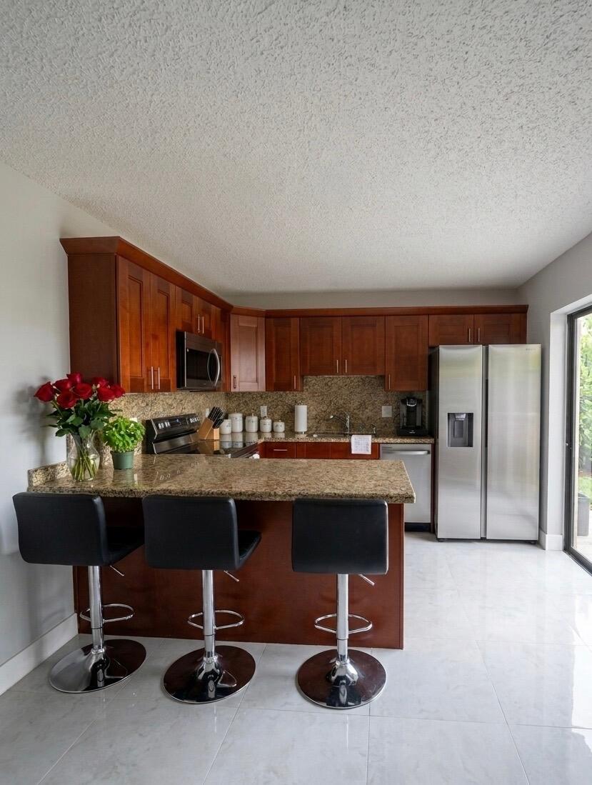 Photo of 2245 WHITE PINE Circle #D, Greenacres, FL 33415 (MLS # B26059447)