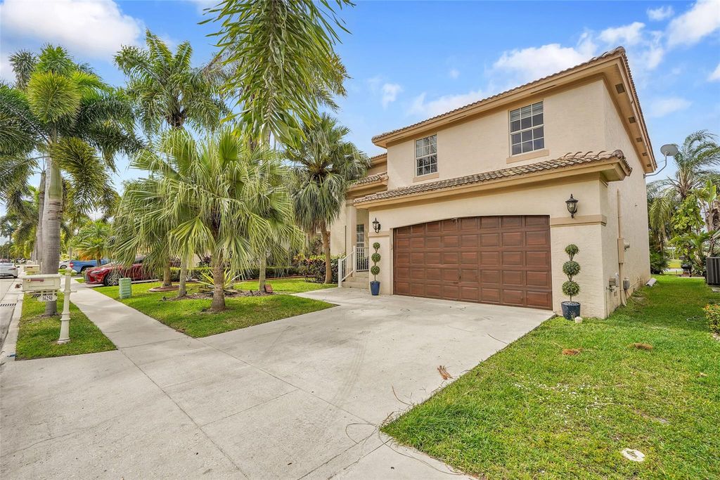 Photo of 16250 La Costa Drive, Weston, FL 33326 (MLS # F10499376)