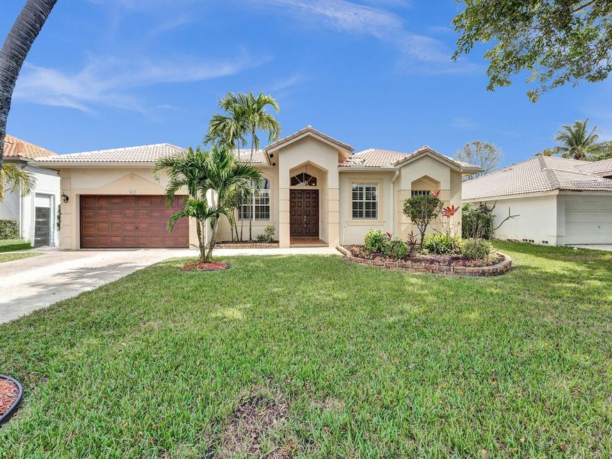 WHERE CLASS AND GRACE MEET STYLE AND ELEGANCE. 5 Bed/3 bath home situated on a tranquil canal lot, cul-de sac street. Triple split floor plan, fifth bedroom used as den/office. Elegant marble floors throughout. Designer kitchen an abundance of wood cabinets, granite countertops, walk in pantry with shelving, S/S appliances. Laundry with sink. Open and bright family room with slider to paver patio.  Spacious master bedroom with tray ceiling, walk in closets w/ built-ins, dual sinks, separate tub and shower.  Neutral colors, hurricane panel protection.  Seller has contracted for a NEW ROOF, and will escrow the monies at time of closing.  Contract to be assigned to new buyer. The escrow will be for all the funds for the roof.  Estimated time for the S Tiles: March, 2024. Paver patio. Low HOA.
