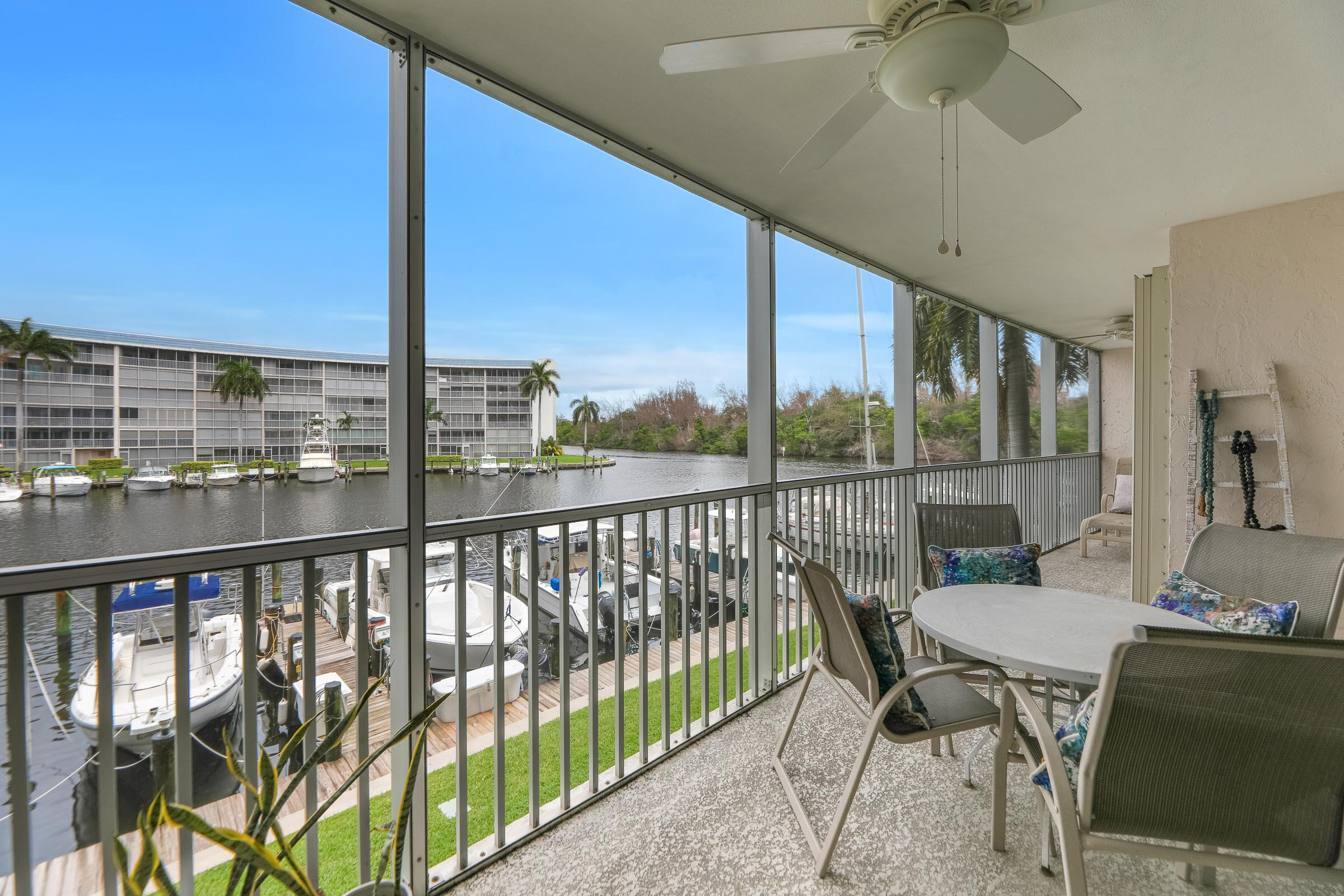 Beautiful 2 bedroom furnished waterfront unit with a truly striking view of long water and Marinas. Enjoy the views from the large balcony that extends from living room to the primary suite. Watch the boats go by on their way to the nearby intercoastal. Light and bright condo is clean and well kept. New floors and comfortable furnishings throughout. Kitchen is fully equipped and includes washer and dryer in the unit. Many shops and restaurants within walking distance. Hillsboro Cove is an active 55+ waterfront community with all the amenitities to enjoy your stay; clubhouse, gym, library, pool, BBQ grills kayak storage, jet ski dry dock. Walking distance to the sandy beach, Sullivan Intercoastal Splash Park, supermarket, drugstores, beauty salons, restaurants and more! Book a showing tod
