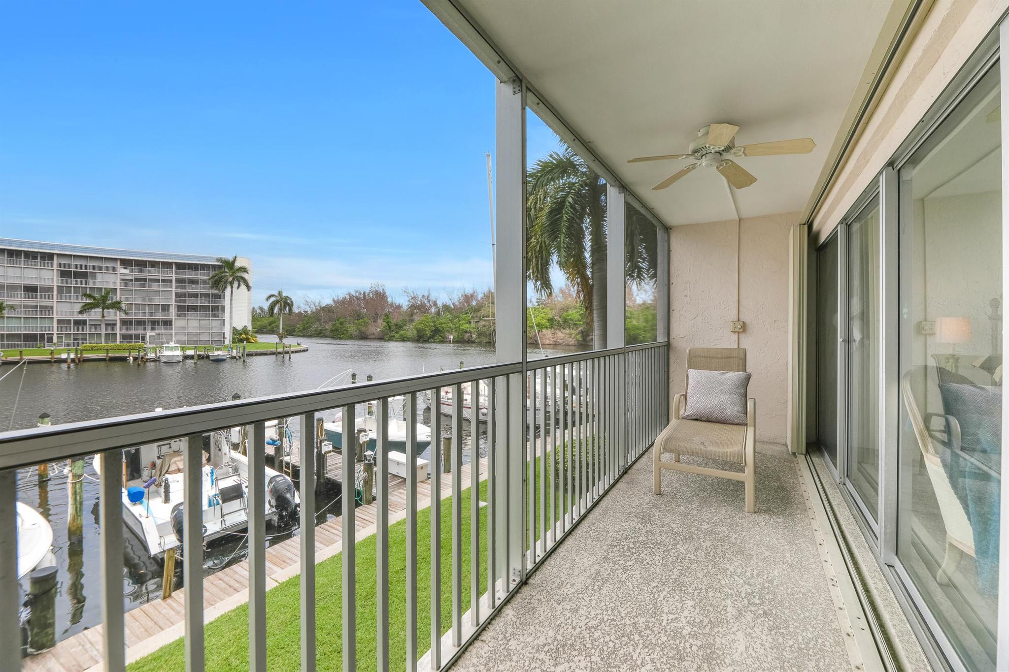 Beautiful Seasonal two bedroom furnished waterfront unit with a truly striking view of a long river and a Marina. Enjoy the views from breakfast to evening from the large balcony. Watch the boats go by on their way to the intercoastal. Light and bright condo is clean and well kept. New floors and comfortable furnishings throughout. Kitchen is fully equipped and includes washer and dryer in the unit. Many shops and restaurants within walking distance. Hillsboro Cove is an active 55+ waterfront community with all the amenitities to enjoy your stay; clubhouse, gym, library, pool, BBQ grills kayak storage, jet ski dry dock. Walking distance to the sandy beach, Sullivan Intercoastal Splash Park, supermarket, drugstores, beauty salons, restaurants and more! Book a showing today!