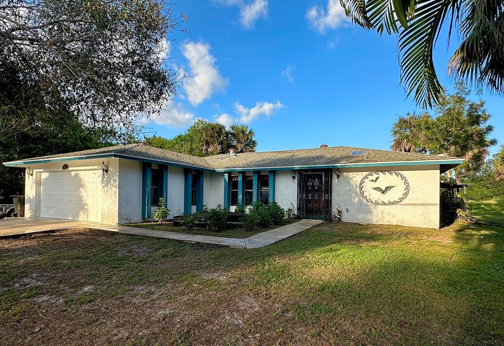 Photo of 1975 SW Import Drive, Port Saint Lucie, FL 34953 (MLS # R11149573)