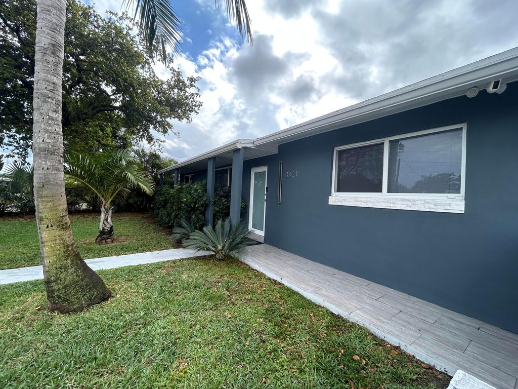 Photo of 4321 NW 15th Avenue, Oakland Park, FL 33309 (MLS # B26002360)