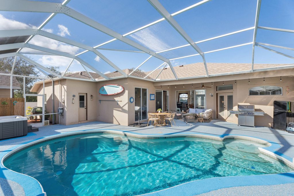 Photo of 518 SW Ray Avenue, Port Saint Lucie, FL 34983 (MLS # R11157646)