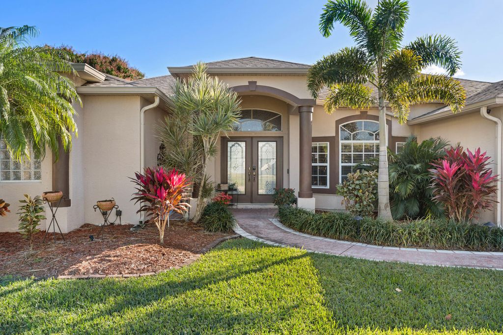 Photo of 518 SW Ray Avenue, Port Saint Lucie, FL 34983 (MLS # R11157646)