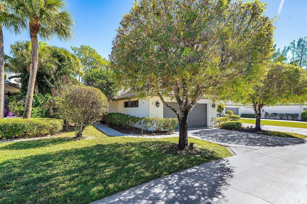 Photo of 1120 Sand Drift Way #A, West Palm Beach, FL 33411 (MLS # R11164172)