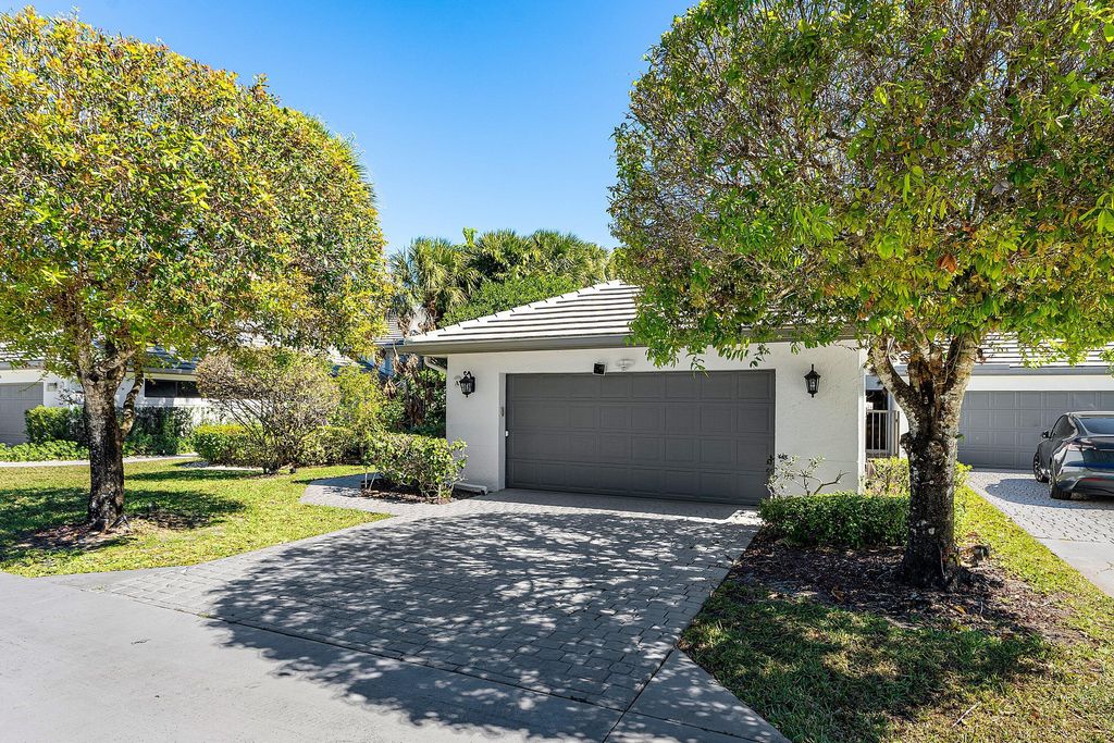 Photo of 1120 Sand Drift Way #A, West Palm Beach, FL 33411 (MLS # R11164172)