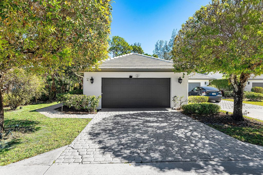 Photo of 1120 Sand Drift Way #A, West Palm Beach, FL 33411 (MLS # R11164172)