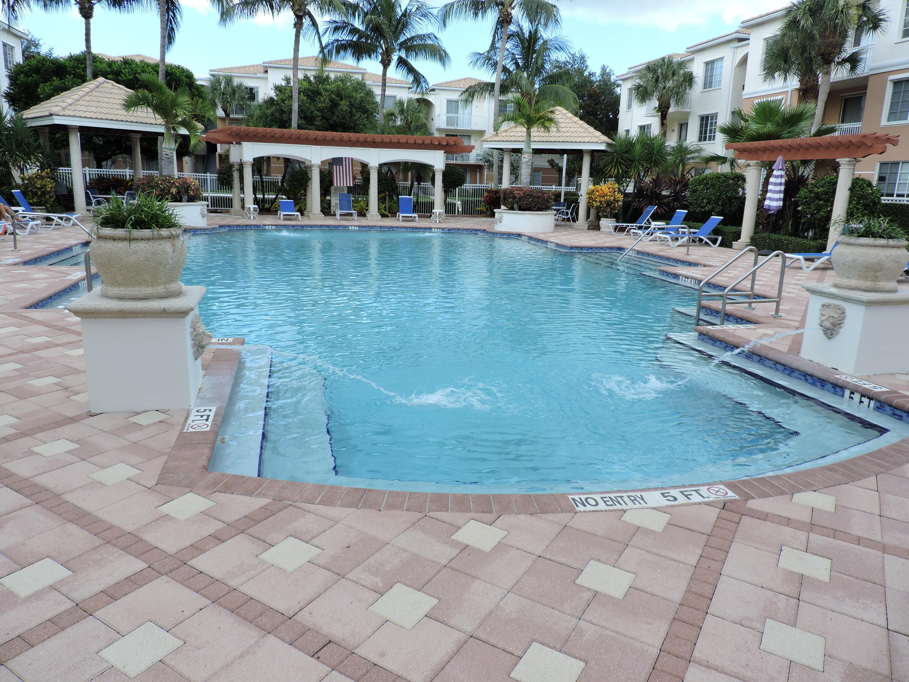 Great neighborhood in gated resort community which has it all. This 2 bedroom, 2 full bath 3rd floor 1,213 square feet under air. Flooring has 16'' marble diagonal tile through out (NO carpet). Entire unit has been freshly painted with some upgrades with new lighting, mirrors in bathrooms, new shower heads and more. All newer appliances with stainless steel refrigerator, microwave, range, dishwasher and Samsung washer and dryer. Florida room off of living room. Community has a resort pool, gym, kids play area, barb-b-que area, meeting room, media room. Close to all shopping including Publix grocery store, restaurants, banks, shopping, Abacoa public golf course and I-95.