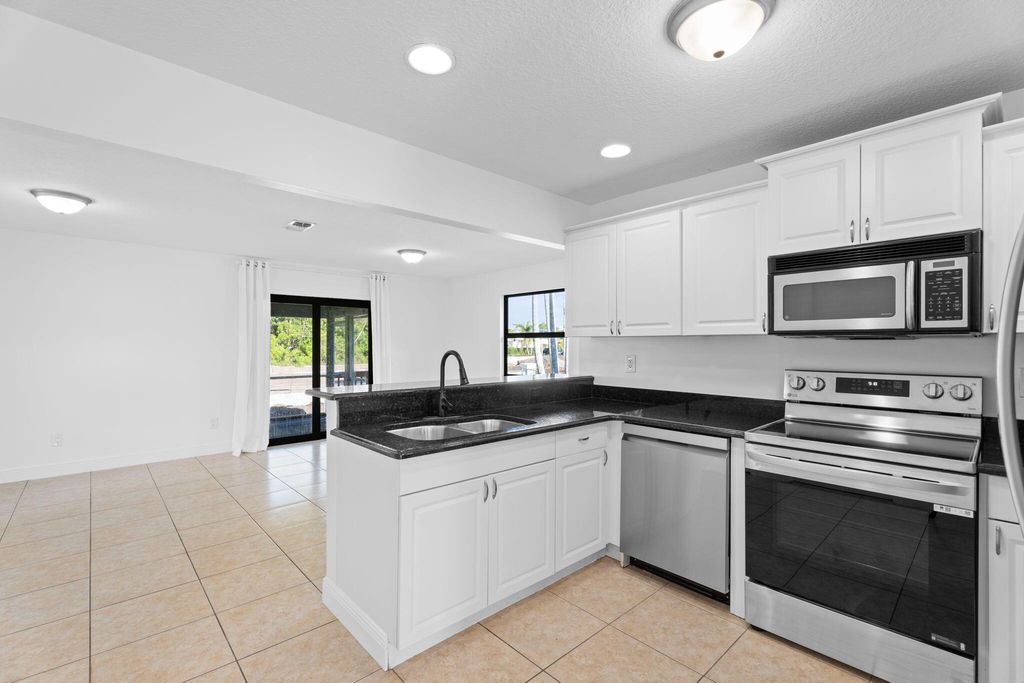 Photo of 3406 SW Feroe Avenue, Palm City, FL 34990 (MLS # R11120674)