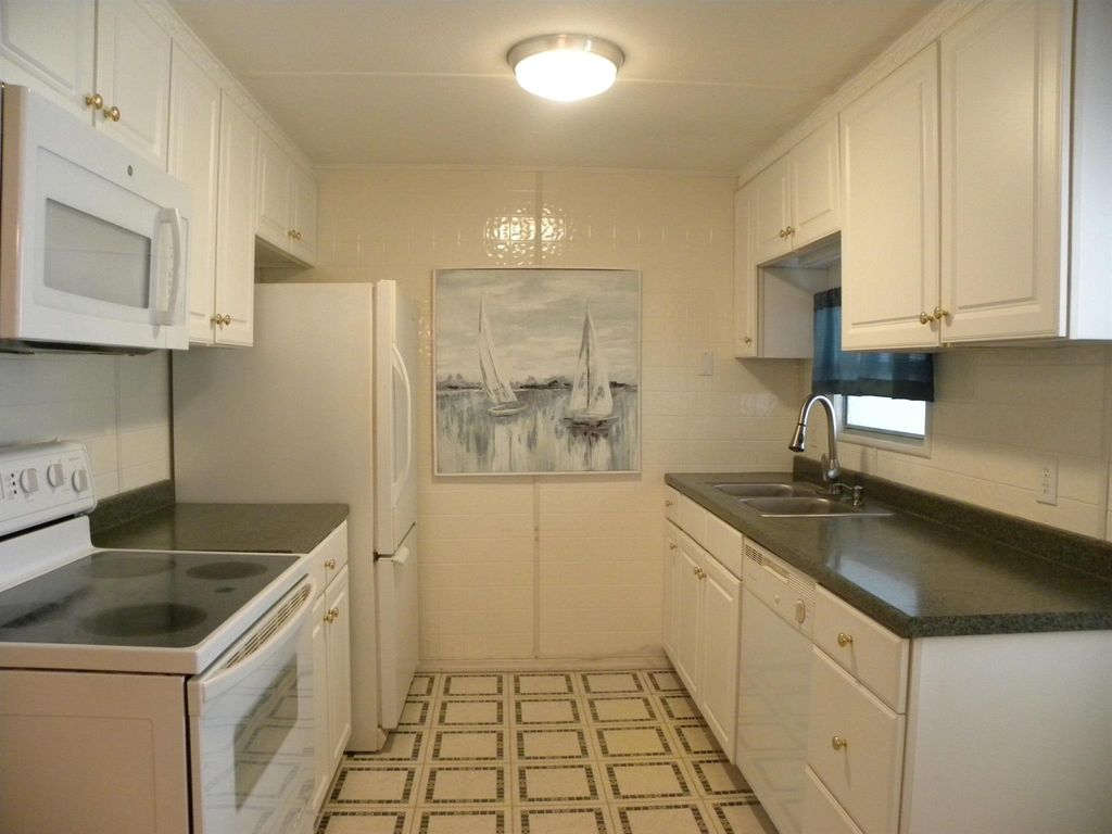 Photo of 7 Spanish Way, Port Saint Lucie, FL 34952 (MLS # R10880983)