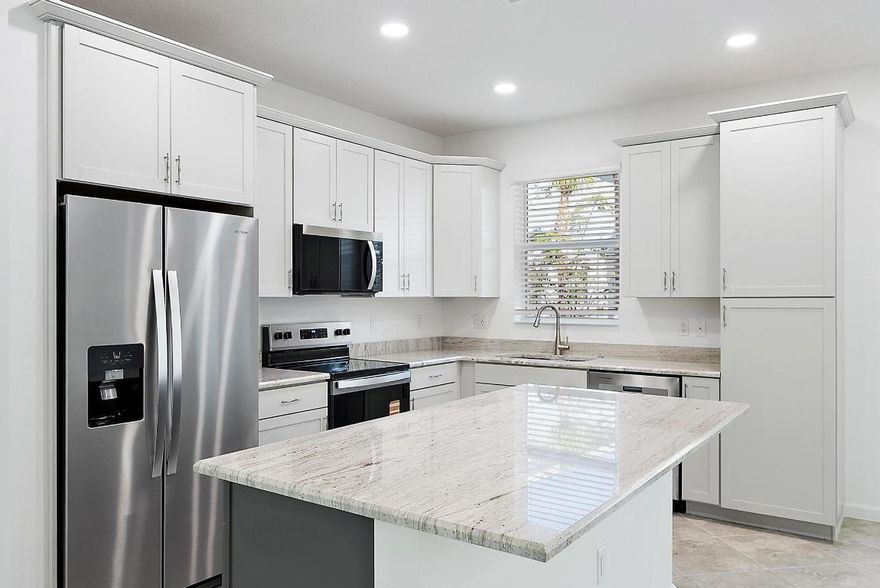 Don't miss the opportunity to live in a brand new Terraces of Westlake 4 bedroom, 2 1/2 bath, 2 car garage luxury town home! Designer finishes include porcelain tile, custom cabinets, granite counters, stainless steel appliances, spacious floor plan, volume ceilings, impact glass windows and covered terrace. Westlake amenities are amazing including the Adventure Park featuring a soft surface splash pad, lagoon pool, adult lap pool and tower slide. Visit Scoops Ice Cream and the Snack Shack! Enjoy the BMX Pump Park, bocce ball courts, basketball courts and event/concert pavilion. There is even a Paw Park for your furry family members!  Call today for rental details!