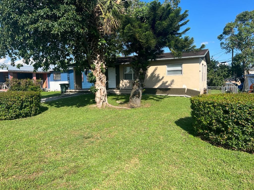 Photo of 573 SW 11th Street, Belle Glade, FL 33430 (MLS # R10913653)