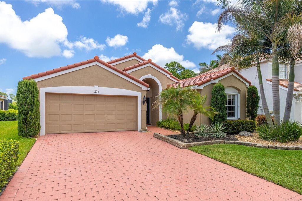 Photo of 6948 SE Twin Oaks Circle, Stuart, FL 34997 (MLS # B26033694)