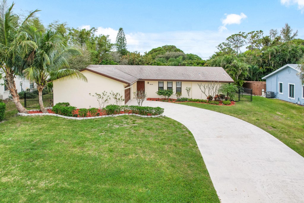 Photo of 4409 Colette Drive, Jupiter, FL 33469 (MLS # R11064846)