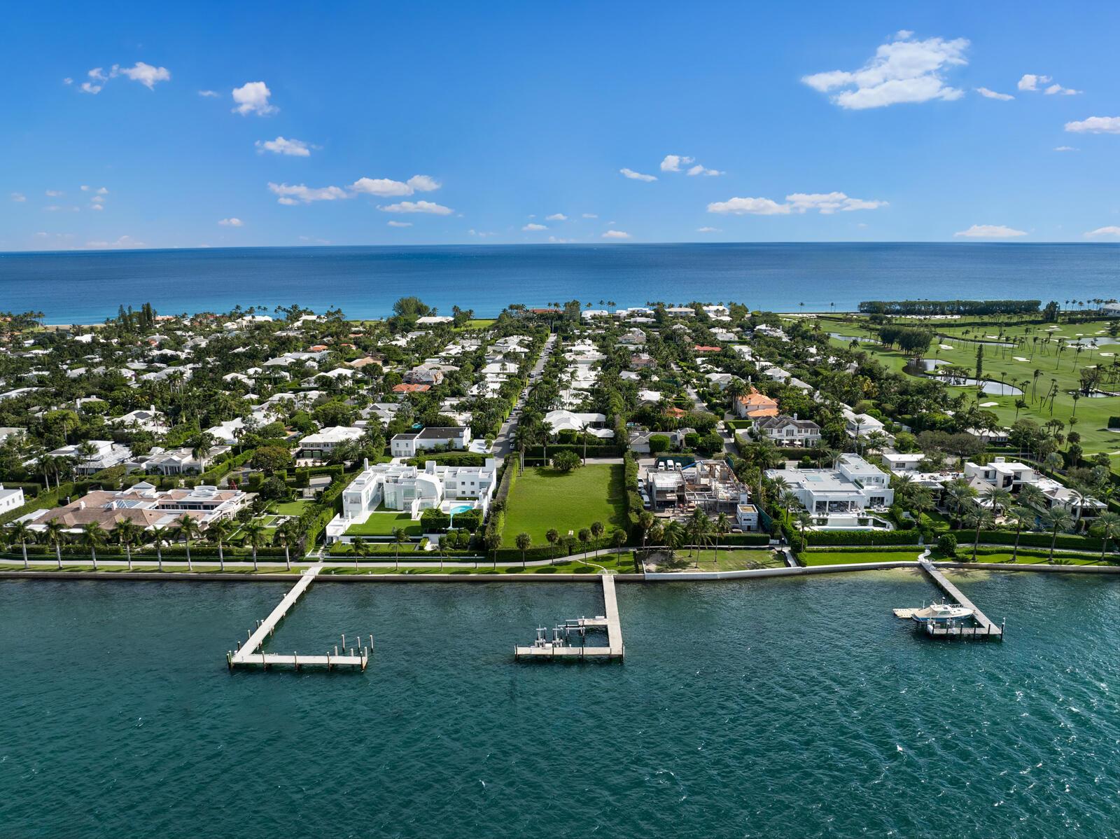 Opportunity awaits to build your dream home on this expansive 34,848-square-foot lot, offering 128 feet of water frontage and a very high elevation. This prime location not only provides a canvas for your ideal home, but also boasts a deep-water concrete dock, providing the perfect haven for maritime enthusiasts. The dock is thoughtfully designed to accommodate larger vessels over 100 feet, along with multiple smaller vessels. The dock features a substantial 40,000-pound lift for larger boats, and an additional 15,000-pound lift for smaller boats. Experience the epitome of waterfront living with unparalleled views and amenities on this expansive property. Enjoy deeded beach access nestled between Sandpiper and Eden Road and access to the Lake Trail right out your back gate.