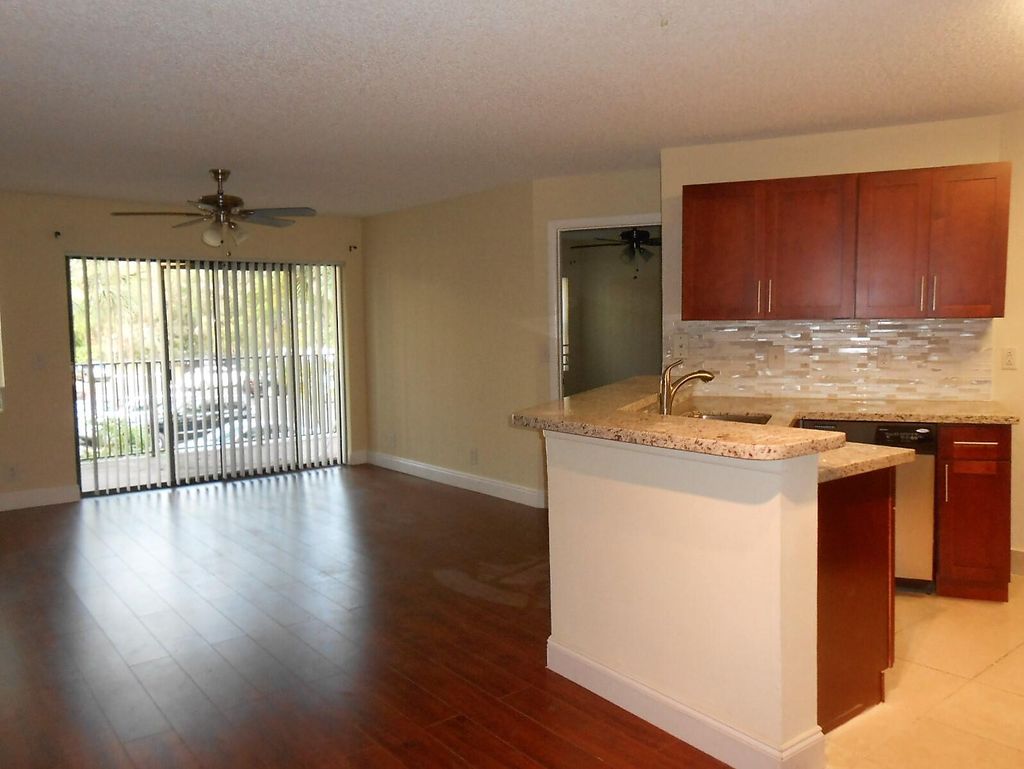 Photo of 9999 Summerbreeze Drive #1008, Sunrise, FL 33322 (MLS # B26003734)