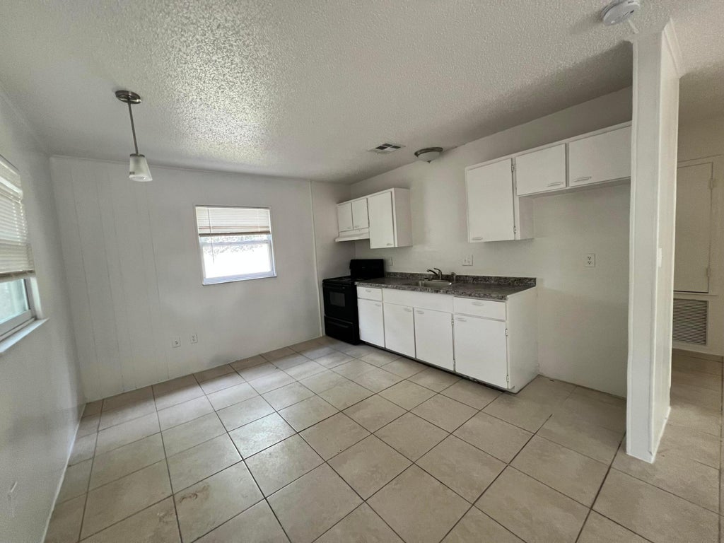 Photo of 3258 S 7th Street, Fort Pierce, FL 34982 (MLS # R11082002)
