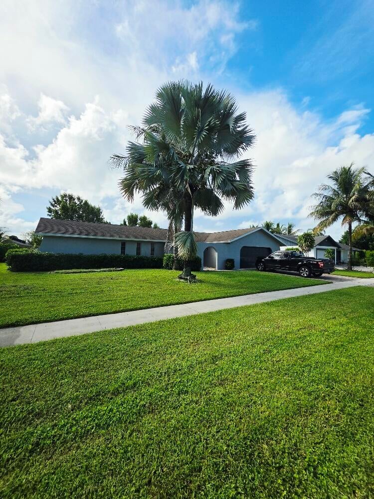 Photo of 12758 Guilford Circle, Wellington, FL 33414 (MLS # B26074695)