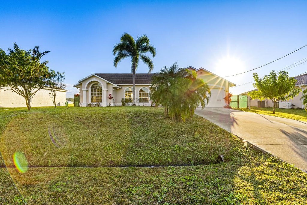 Photo of 2061 SW Imperial Street, Port Saint Lucie, FL 34953 (MLS # R11058237)