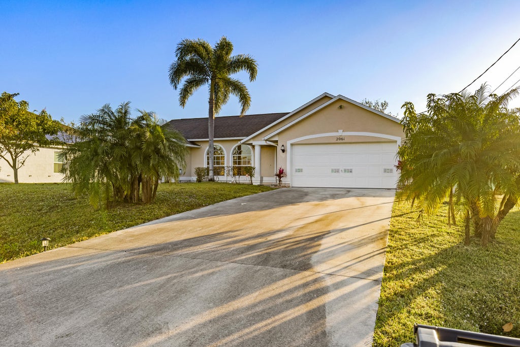 Photo of 2061 SW Imperial Street, Port Saint Lucie, FL 34953 (MLS # R11058237)