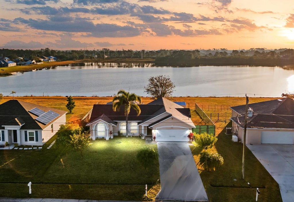 Photo of 2061 SW Imperial Street, Port Saint Lucie, FL 34953 (MLS # R11058237)