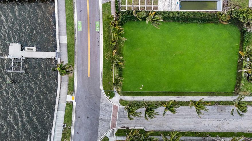 WATERFRONT PROPERTY W/DOCK. Enjoy expansive Intracoastal views from this supremely located parcel near the Southern Bridge to Palm Beach Island across from the Mar-a-Lago Club. Ideal for Boater's, offering a private dock with a 16,000 lb boat lift and separate floating dock for additional water toys.