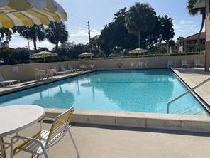 Photo of 3712 N University Drive #I-7, Coral Springs, FL 33065 (MLS # B26033501)