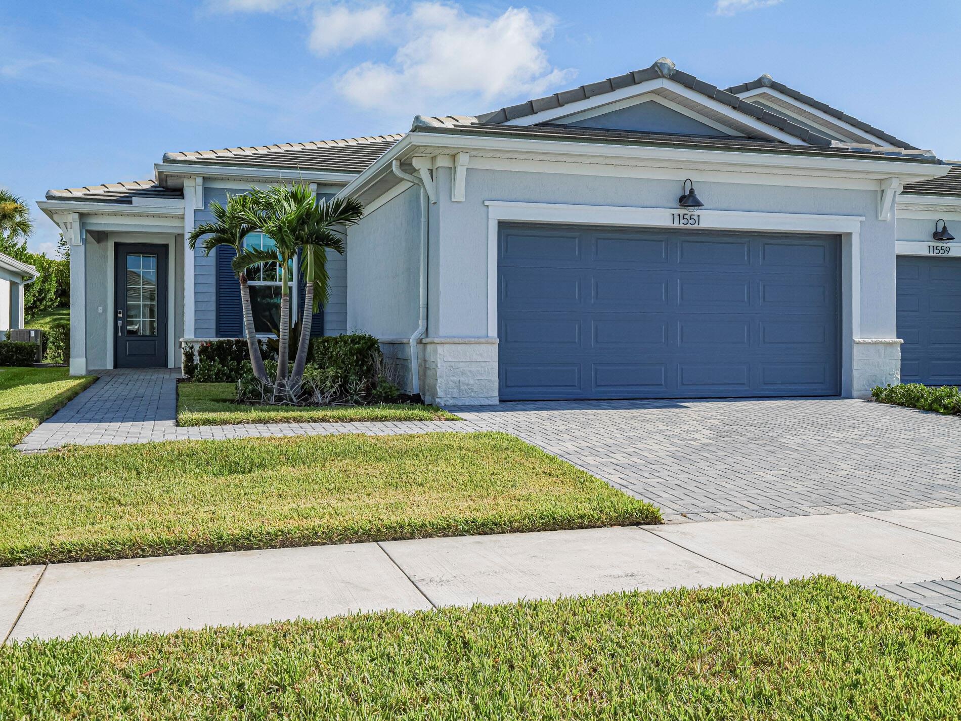 Live your best Florida life in this sunny 2-bed + flex room, 2-bath villa in a vibrant 55+ resort-style community! Whip up meals in the gourmet kitchen with quartz countertops, then kick back in the breezy lanai with peaceful backyard views. The whole home is decked out in tile flooring, impact windows, and elegant finishes. Meet friends at the pool, work out at the fitness center, or explore the nearby shops and restaurants of Tradition. Easy living starts here!