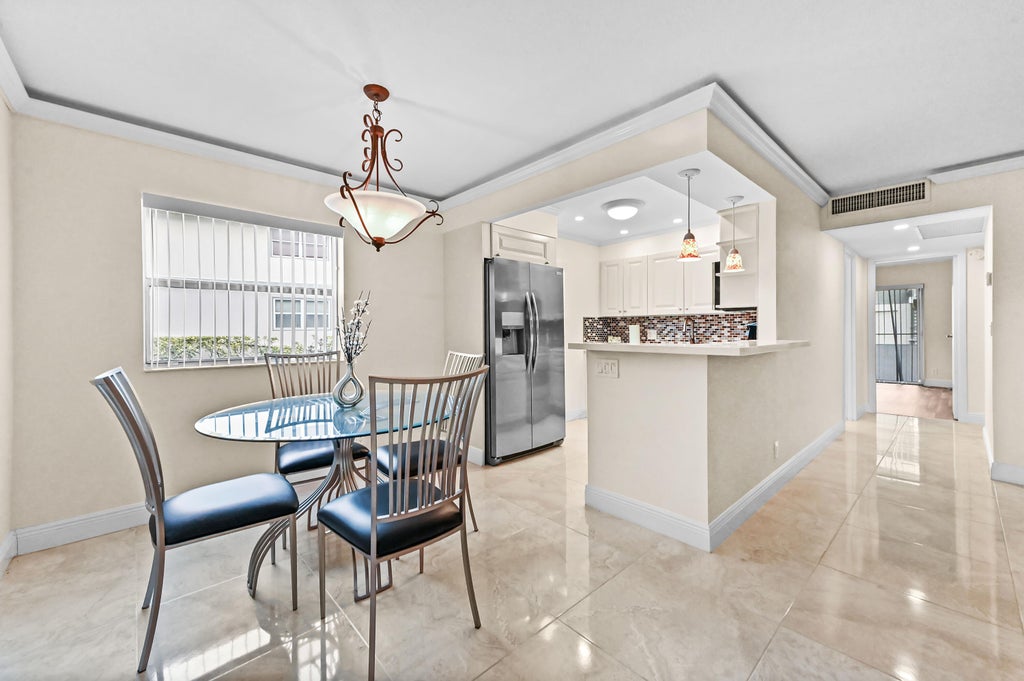 Photo of 205 Flanders E Ln, Delray Beach, FL 33484 (MLS # B26044830)