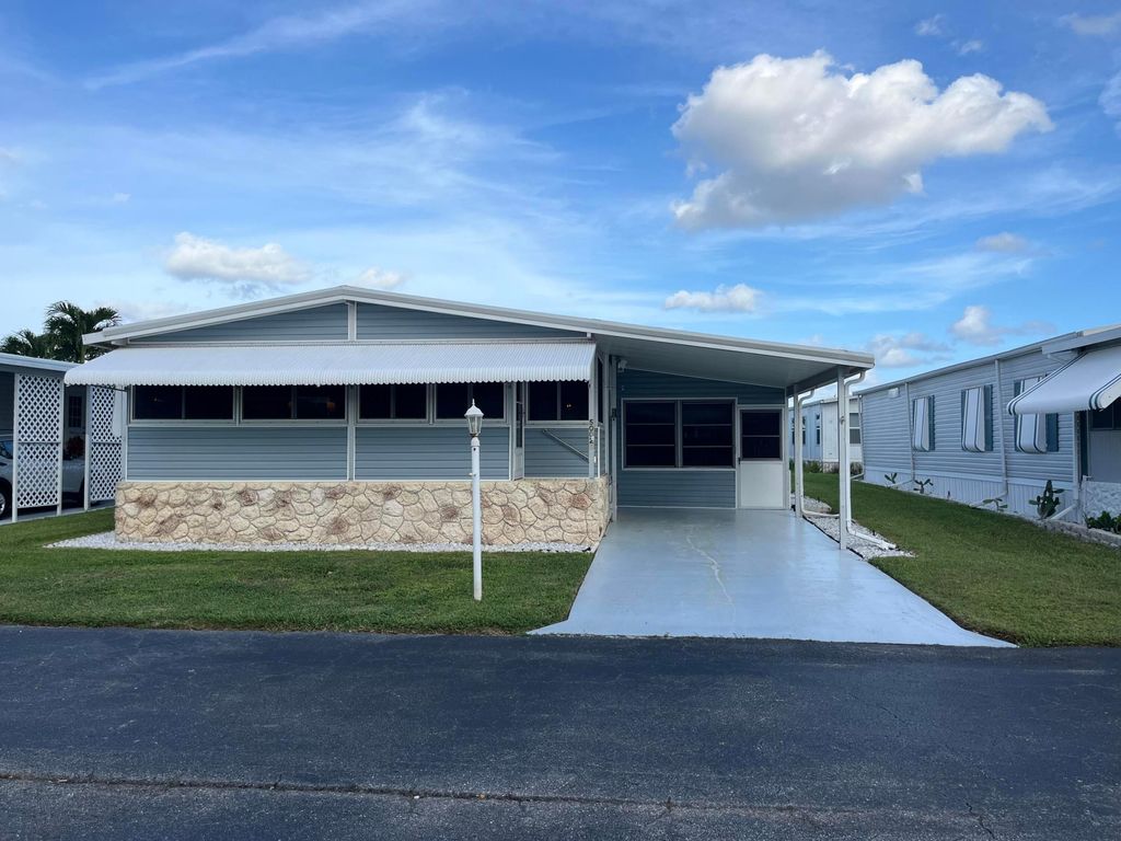 Photo of 50021 Hacha Bay, Boynton Beach, FL 33436 (MLS # R11030808)