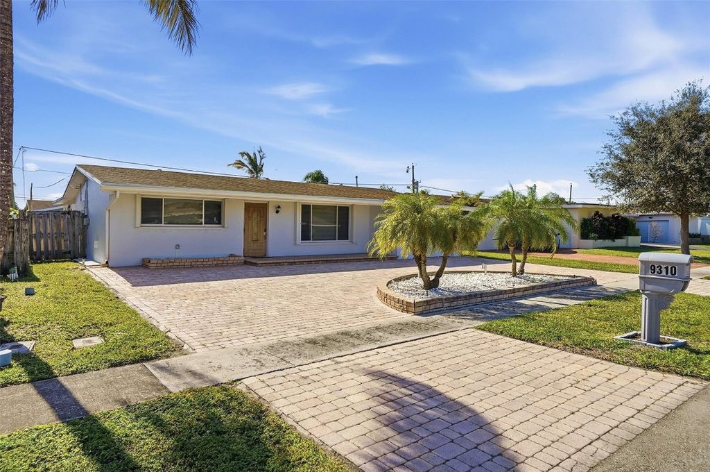 Photo of 9310 NW 26th Street, Sunrise, FL 33322 (MLS # F10548575)