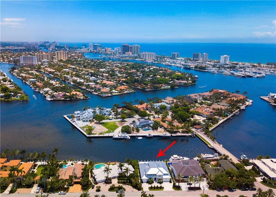 Brand new Coastal Modern direct intracoastal residence offers the most amazing open views from one of Harbor Beach's finest & most valuable isles! Timeless design offers a highly welcoming appeal! The elegant island ambiance & soft blue-grey interiors create a beautiful living environment flows seamlessly from indoor to outdoor entertaining areas. Open great room features fireplace, custom stone/hardwood flooring, elegant formal dining room & crisp white kitchen open to breakfast area. All open to impressively large poolside loggia, outdoor living room fireplace & Summer Kitchen. Expansive downstairs Master Suite, library - second level VIP Guest Suite & two additional bedroom suites, 5th bedroom currently used as Den. Architect Stofft/Builder Sarkela guarantees a high quality offering.