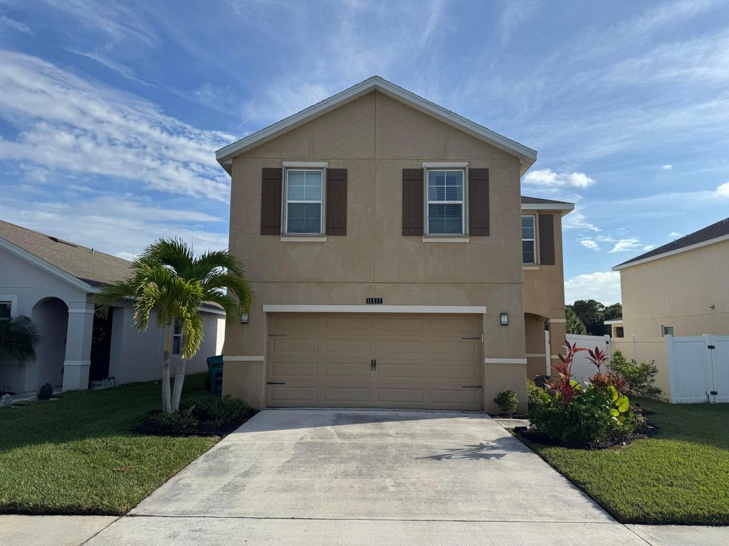 Photo of 11217 SW Sophronia Street, Port Saint Lucie, FL 34987 (MLS # R11144944)