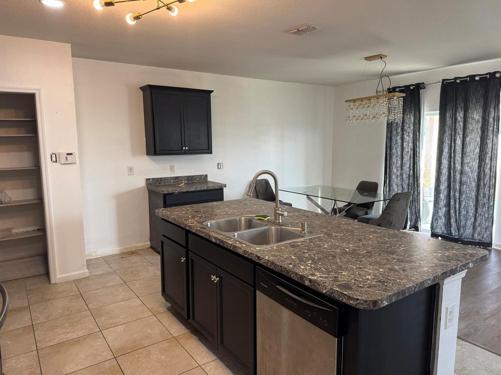 Photo of 11217 SW Sophronia Street, Port Saint Lucie, FL 34987 (MLS # R11144944)