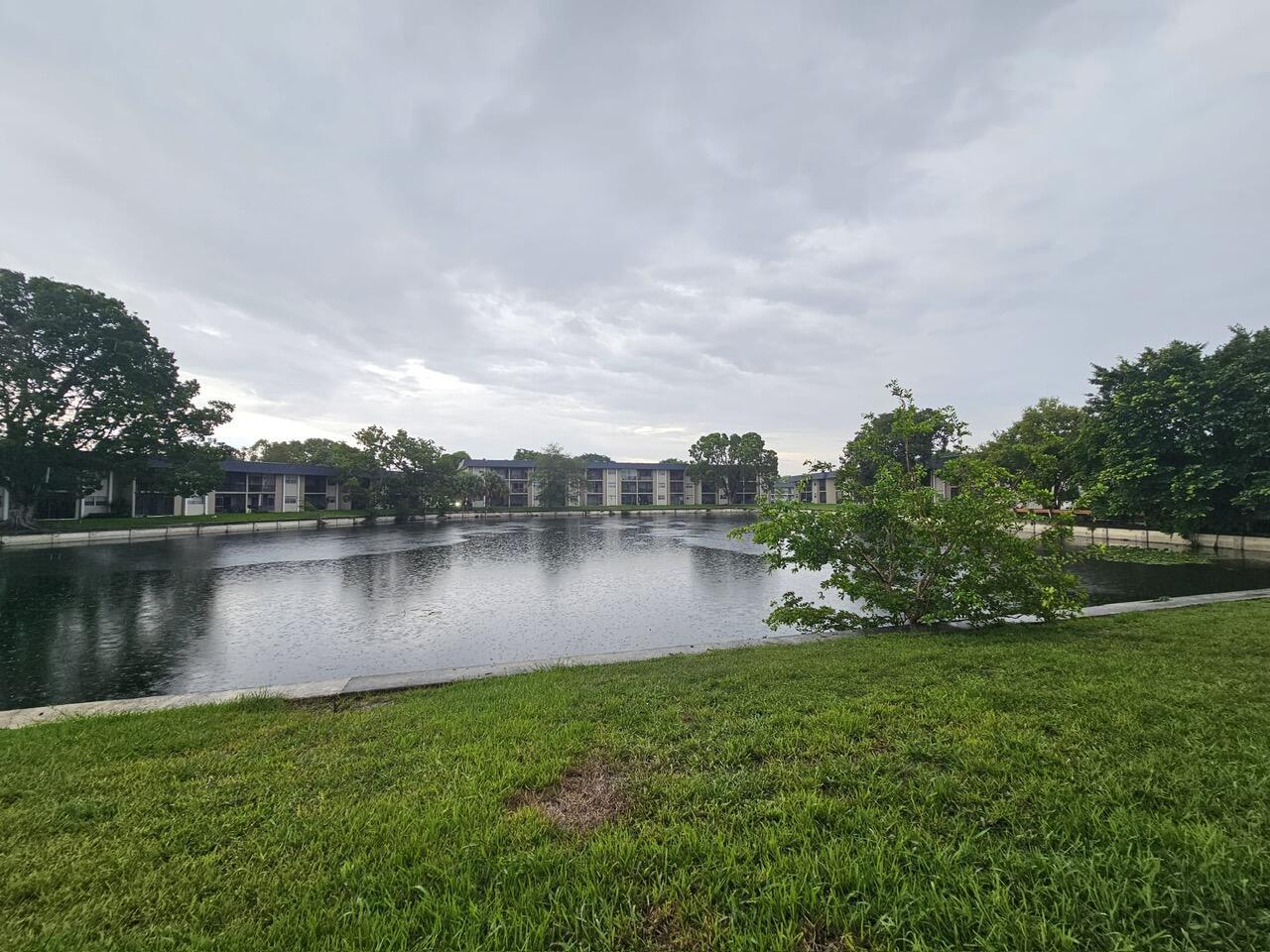 Updated 2/2 condo with brand new flooring, and screened patio. Ground-floor unit in a well-kept community with pool, clubhouse, and tennis. Great Tamarac location close to shopping and highways.