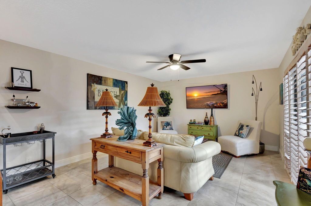 Photo of 99 Lake Arbor Drive, Palm Springs, FL 33461 (MLS # R11013418)