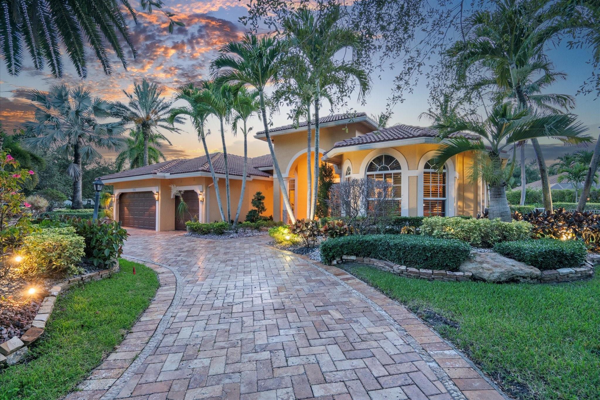 Welcome to Fox Ridge, one of Parkland’s premier gated communities. This exquisite 5bedroom, 3bathroom home sits on an oversized .38-acre lot surrounded by lush landscaping, offering a private retreat with a natural stone pool deck, spa, summer kitchen, & roll-out sunshade. Inside, marble floors, volume ceilings, & a grand art glass foyer set a luxurious tone. The gourmet kitchen features all-wood cabinetry, stainless steel appliances, wine chiller, & pantry. The primary suite boasts floor-to-ceiling windows, dual closets, a sitting area, & a spa-like bath with jet tub, & walk-in shower. Renovated bathrooms, roof 2020, impact windows & doors, & a paver circular drive with a 3-car garage complete the picture. Lowest HOA dues in all of Parkland.