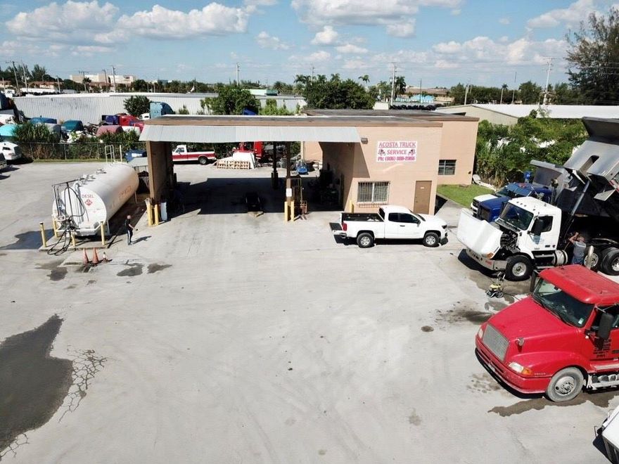 One of a kind opportunity in the Industrial Center of Medley, zoned industrial - light manufacturing.  An incredibly rare find for your commercial business or parking/storage yard, with plenty of parking for trucks and trailers, or anything else.  Nothing else in the area compares.  Property is absolutely perfect for the trucking industry but can be used for an endless variety of businesses.  Definitely an income-generating property.   Amazing industrial location with 54014 SF of fenced-in developed lot with an air-conditioned building for office and/or interior storage space with bathrooms, and parking/storage bay, totaling 2097 SF.  Diesel tanks are on-site for fueling.