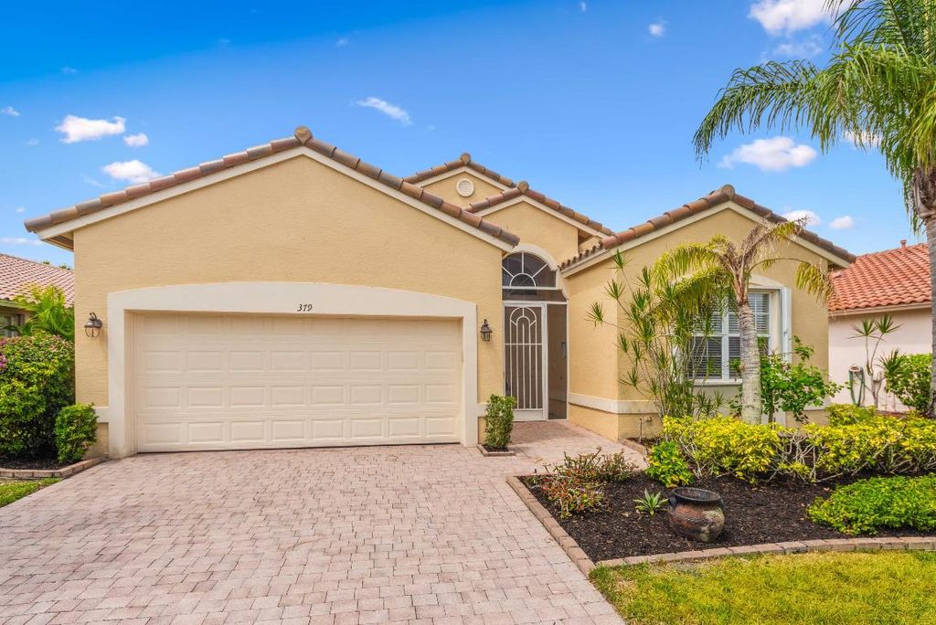 Photo of 379 NW Sunview Way, Port Saint Lucie, FL 34986 (MLS # R10988429)