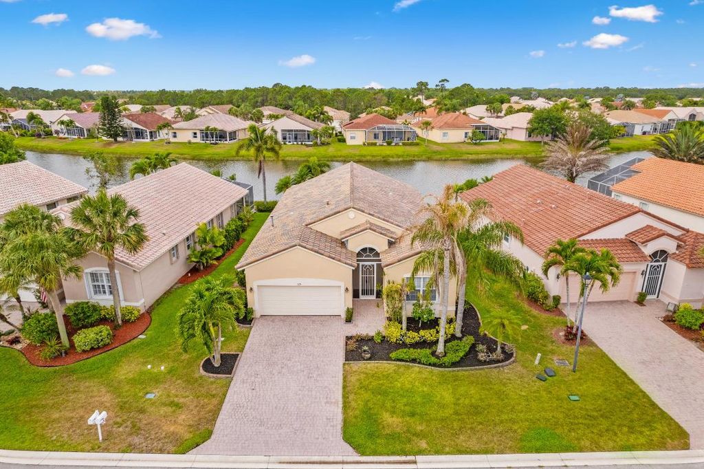 Photo of 379 NW Sunview Way, Port Saint Lucie, FL 34986 (MLS # R10988429)