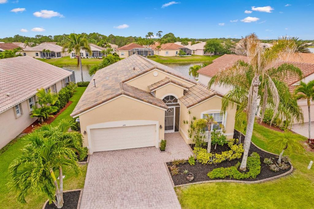 Photo of 379 NW Sunview Way, Port Saint Lucie, FL 34986 (MLS # R10988429)