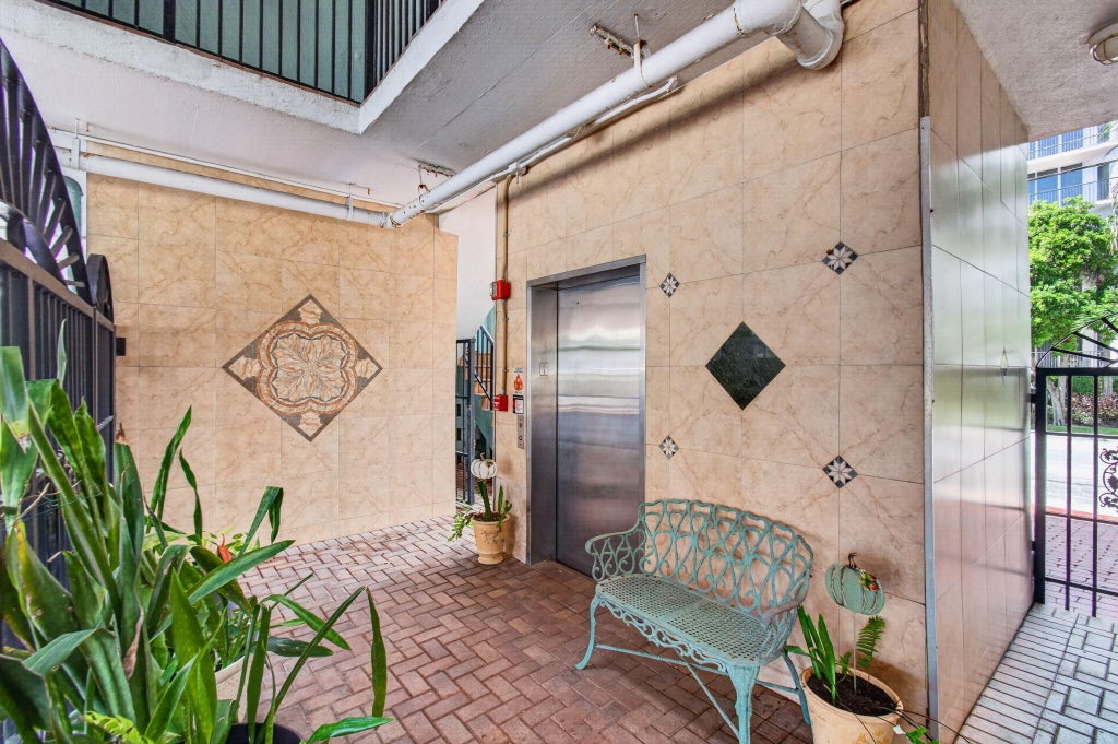 Photo of 180 SE 20th Avenue #403, Deerfield Beach, FL 33441 (MLS # B26081824)