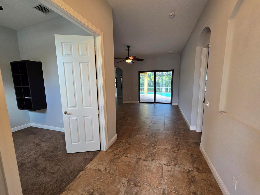 Photo of 2095 NW Diamond Creek Way, Jensen Beach, FL 34957 (MLS # B26040703)