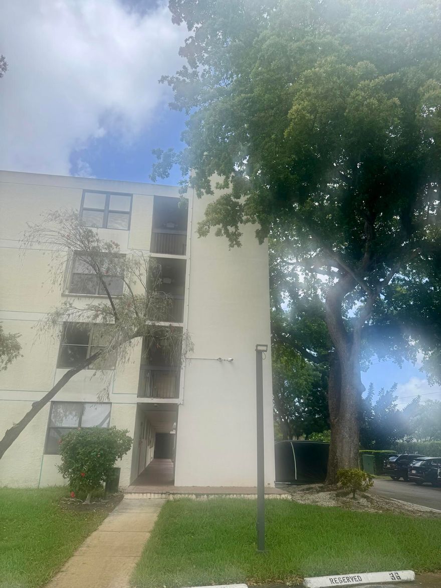 **ATTENTION INVESTORS** This 4th floor 2BR/2BA at Lake Emerald is ready for your personal touch to flip or hold as excellent investment. Forget the rest because this top floor, wide lake view unit is properly priced to allow for your updates & the seller is offering to pay a year's worth of special assessment payments on buyer's behalf at closing. That's a $6000 bonus! With a split bedroom plan & 2 bathrooms plus walk-in closets & great views, it won't take much to get this unit ready for a profitable rental or to as a great flip. Spacious kitchen with pass through to dining area provides that water view while cooking & boasts both a dishwasher & ample cabinet / countertop space. THIS is the Lake Emerald unit to update for your investment needs. Schedule a private viewing today.