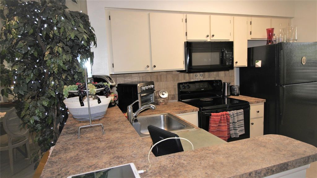 Photo of 2228 N Cypress Bend Drive #104, Pompano Beach, FL 33069 (MLS # F10439109)