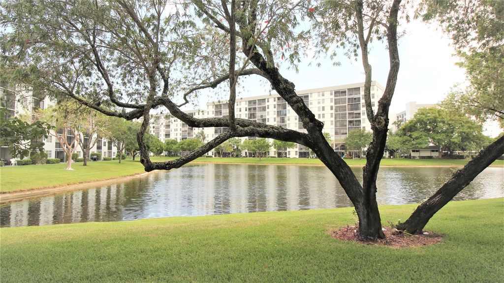 Photo of 2228 N Cypress Bend Drive #104, Pompano Beach, FL 33069 (MLS # F10439109)